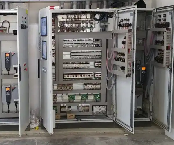 Electrical distribution and control systems, including transformers